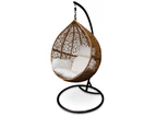 Light Brown Hanging Ball Chair With White Cushions