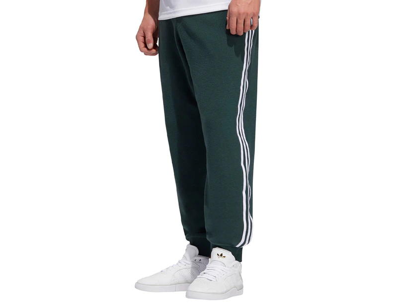 Green and white sale adidas track pants