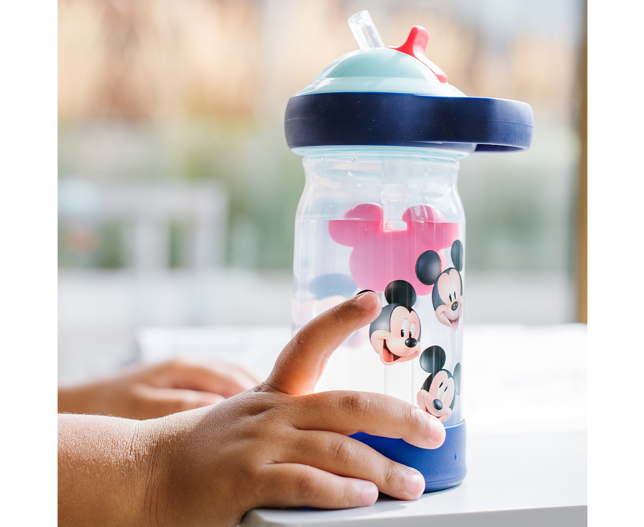 The First Years Disney Frozen Sip & See Toddler Water Bottle with Floating Charm, 12 oz