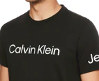 Calvin Klein Jeans Men's Short Sleeve Traveling Logo Crewneck Tee / T-Shirt / Tshirt - Black