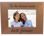 The love between cousins lasts forever - 10cm x 15cm Wood Picture Frame - Great Gift for Birthday, or Christmas for a cousin