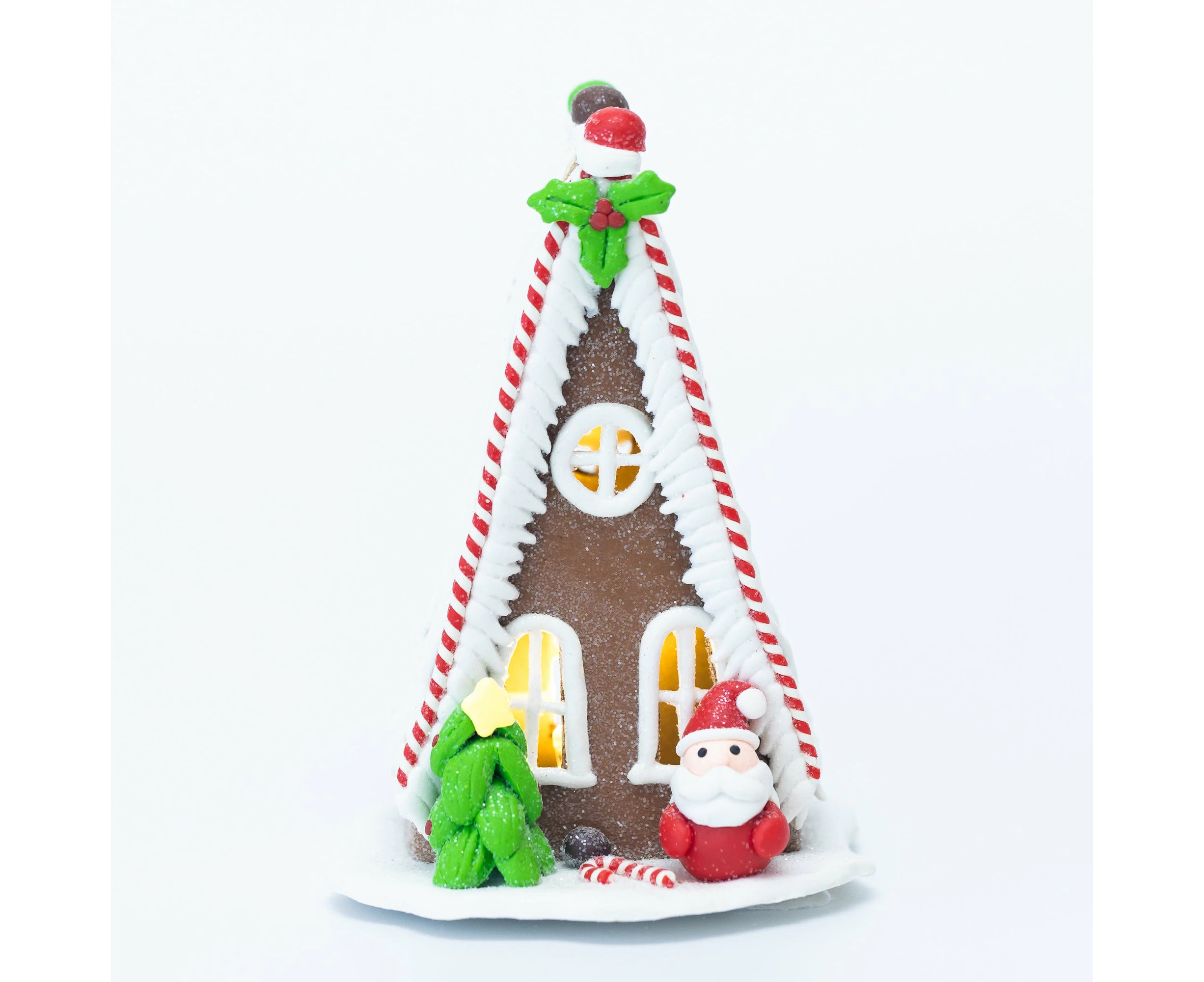 Gingerbread chalet with Santa Claus