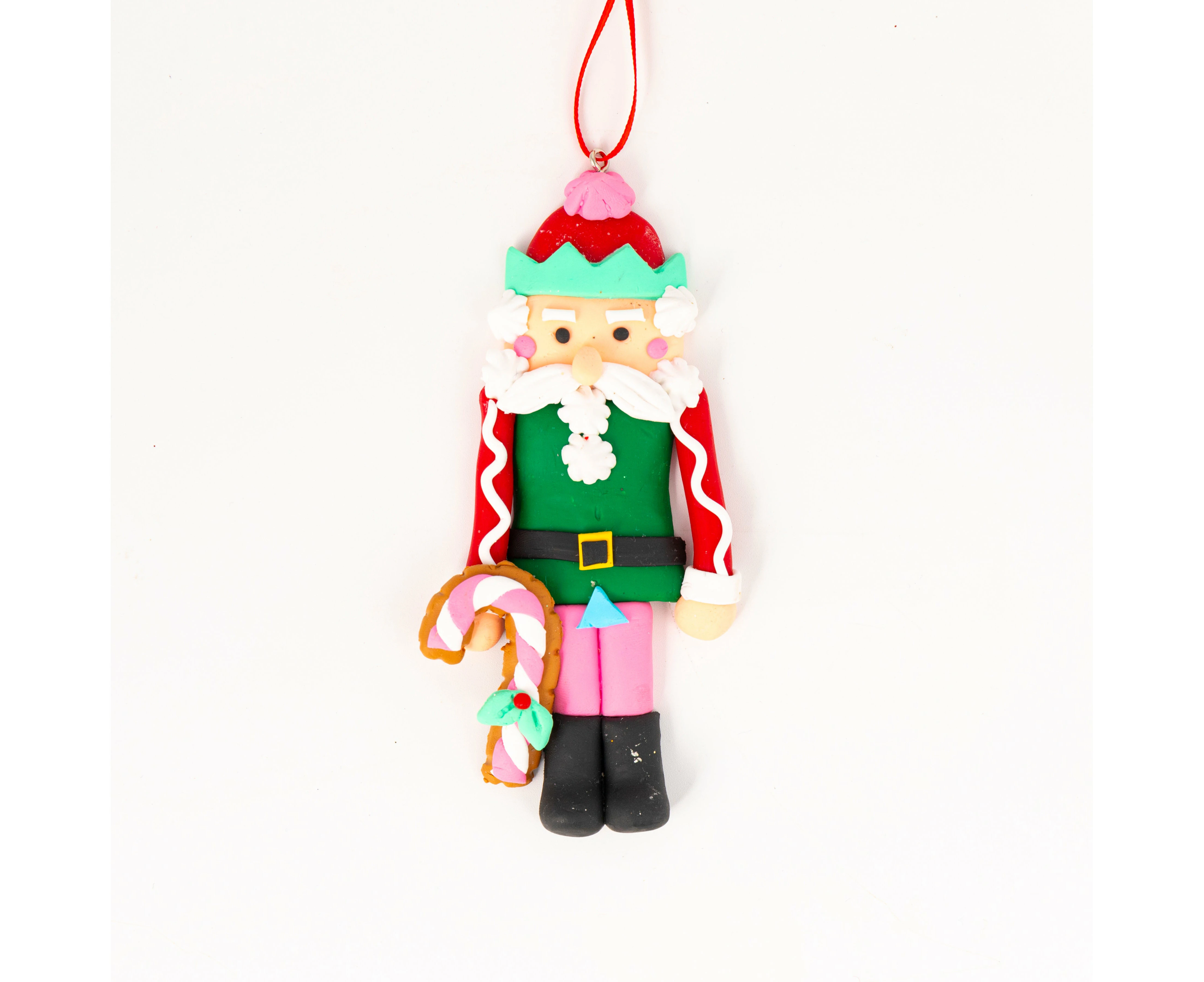 Gingerbread Nutcracker Tree Ornament holding a cane