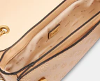 GUESS Geva Convertible Crossbody Flap Bag - Apricot Cream Logo