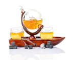 Don Vassie globe decanter set with 2 glasses and a boat shaped mahogany wooden base