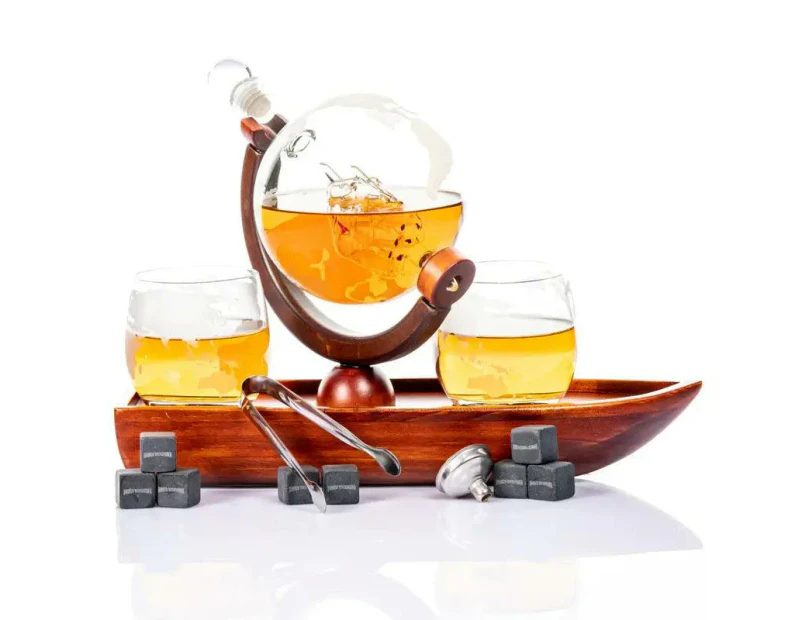 Don Vassie globe decanter set with 2 glasses and a boat shaped mahogany wooden base