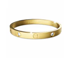 Carrie Stainless Steel Bangle in Gold - 64mm