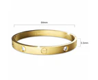 Carrie Stainless Steel Bangle in Gold - 64mm