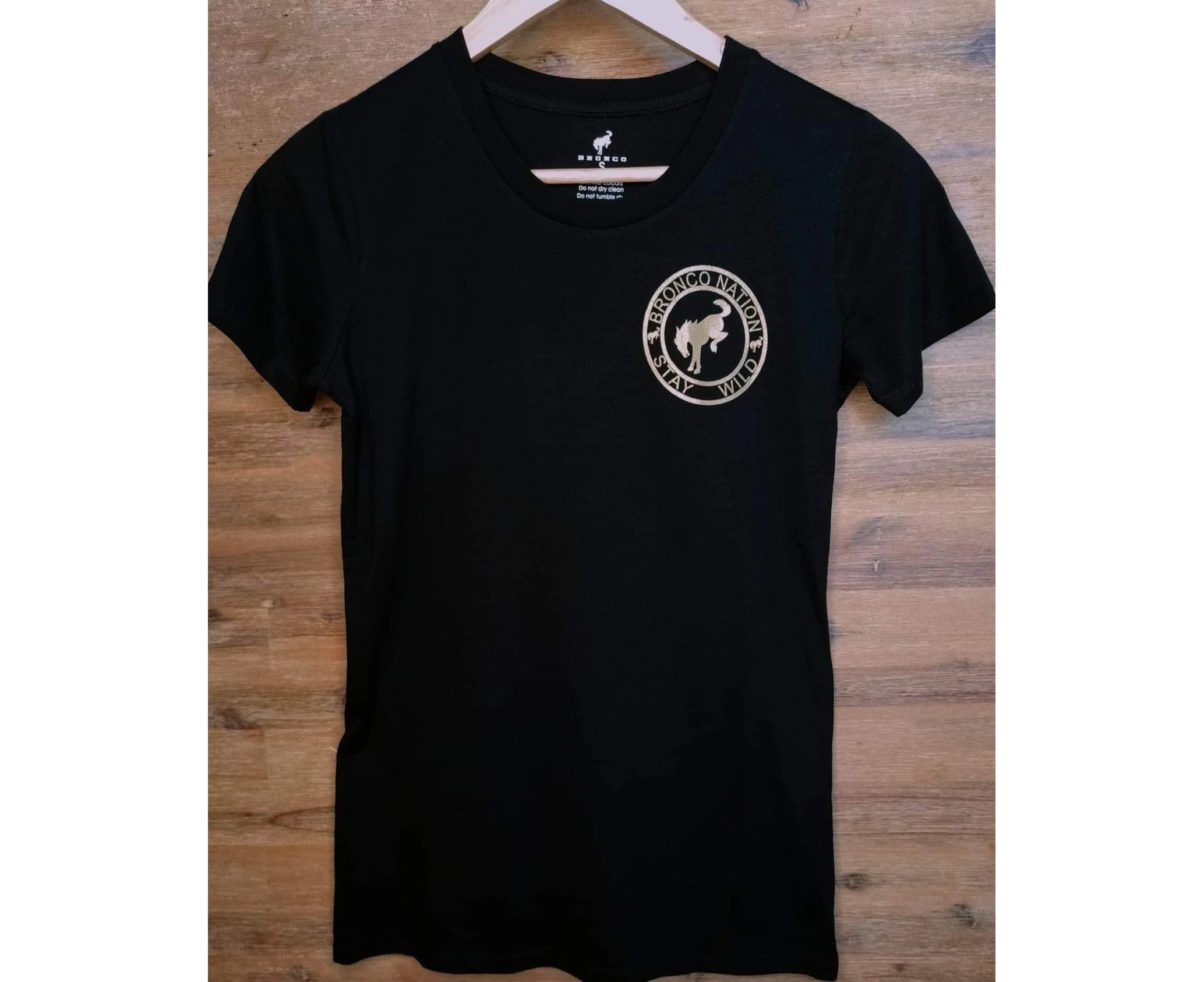 Women's Black shirt Gold Round Logo